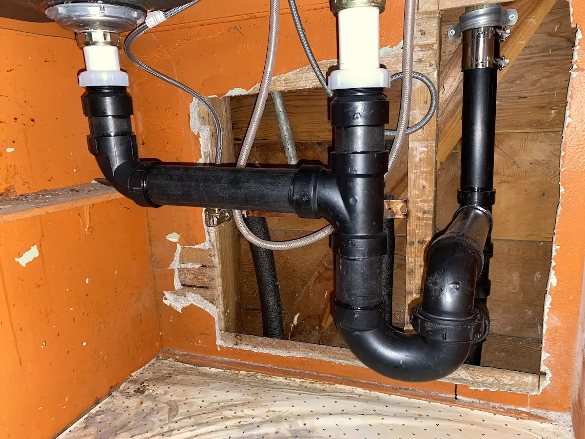 Professional Garbage Disposal Repair equipment and tools on the job in Rockaway